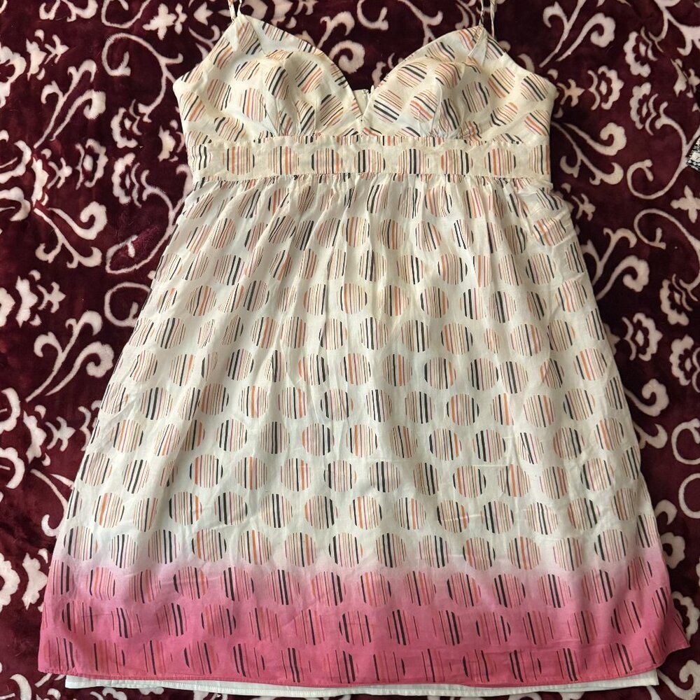 BCBG Paris, and its gradient pattern with sweetheart neckline and gathered waist